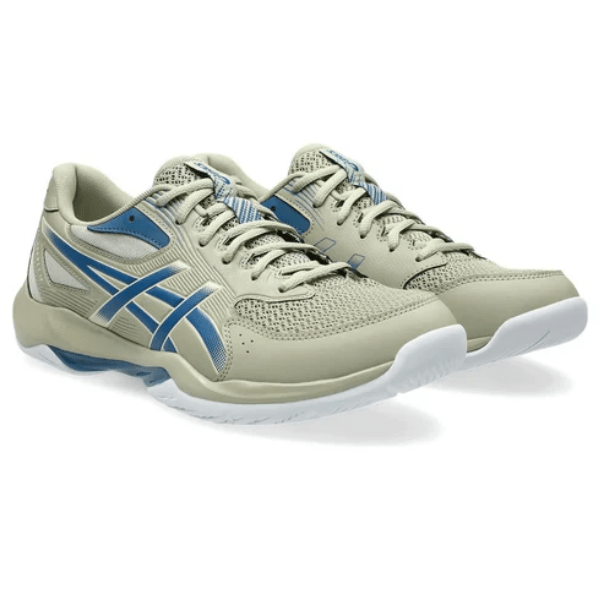 Pair of beige and blue running shoes on a white background