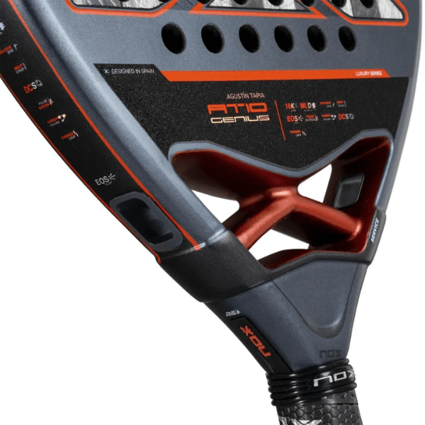 Close-up of a sports racket with branding on a white background