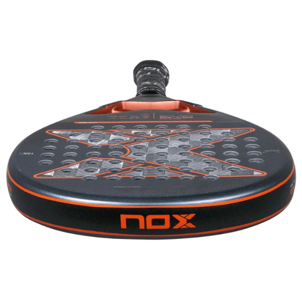 Black and orange nox paddle on a white background