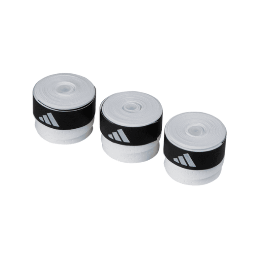 White Adidas overgrip rolls for padel, pickleball, and beach tennis, displayed in a product box.