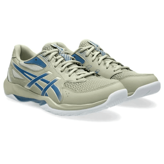 Pair of beige and blue running shoes on a white background