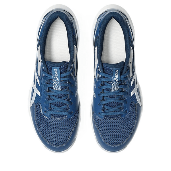 Blue running shoes with white accents on a white background