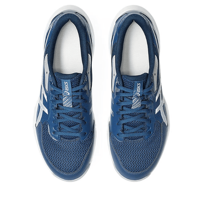 Blue running shoes with white accents on a white background