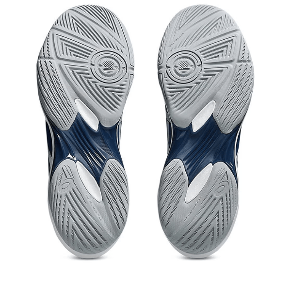 Close-up of a pair of blue and gray athletic shoes on a white background