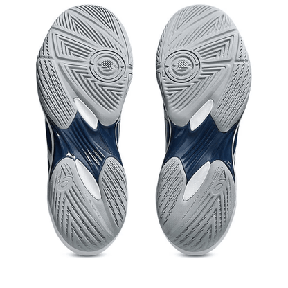 Close-up of a pair of blue and gray athletic shoes on a white background