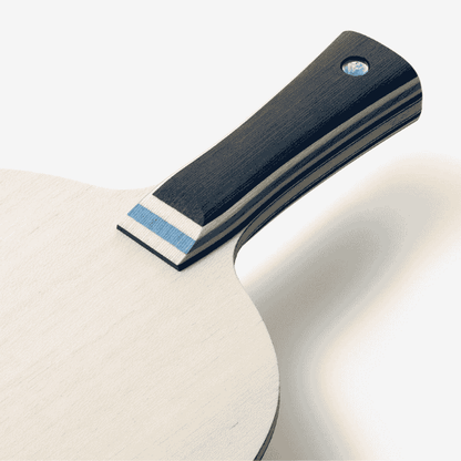 Close-up of a metal tool with a black handle on a white background