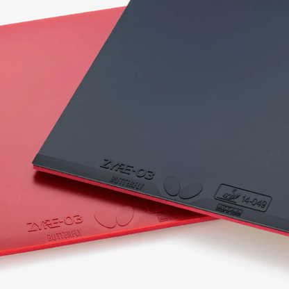 Two table tennis paddles, one red and one black, with 'Butterfly' branding on a light background.