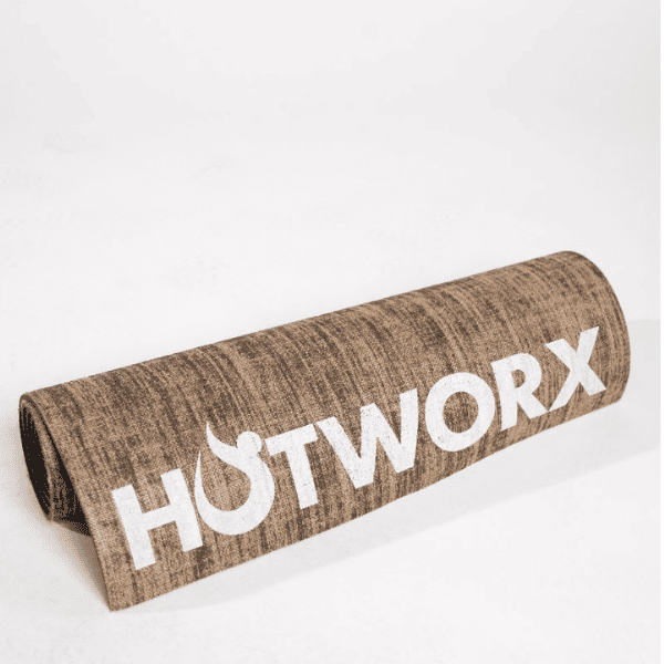 HOTWORX Yoga Mat, a brown yoga and exercise mat designed for stretching, yoga, and floor workouts.