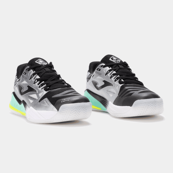 Joma Spin 2612 padel shoes in silver and black, featuring a sleek sporty design for comfort, grip, and stability on the padel court.