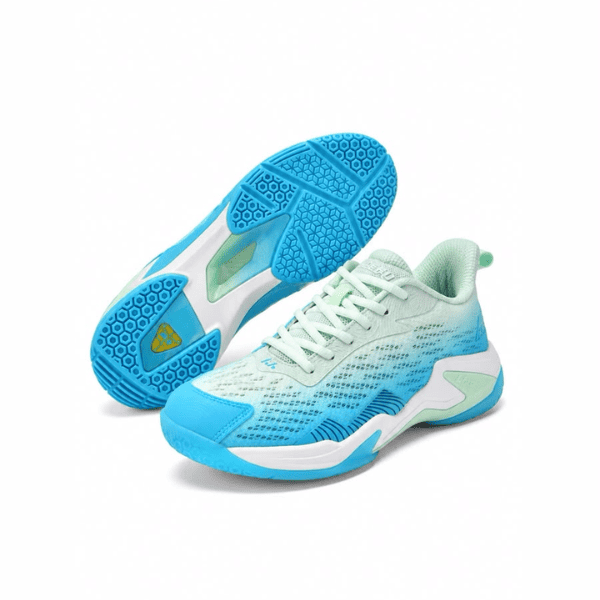 LEFUS badminton shoes in mint green, white, and bright blue with breathable mesh upper, white laces, cushioned sole, and blue patterned outsole displayed on a white background.
