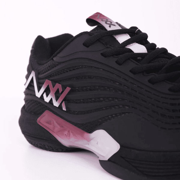 MAXX Vela 3 black badminton shoes designed for indoor court performance and stability.