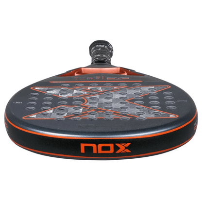 Black and orange nox paddle on a white background