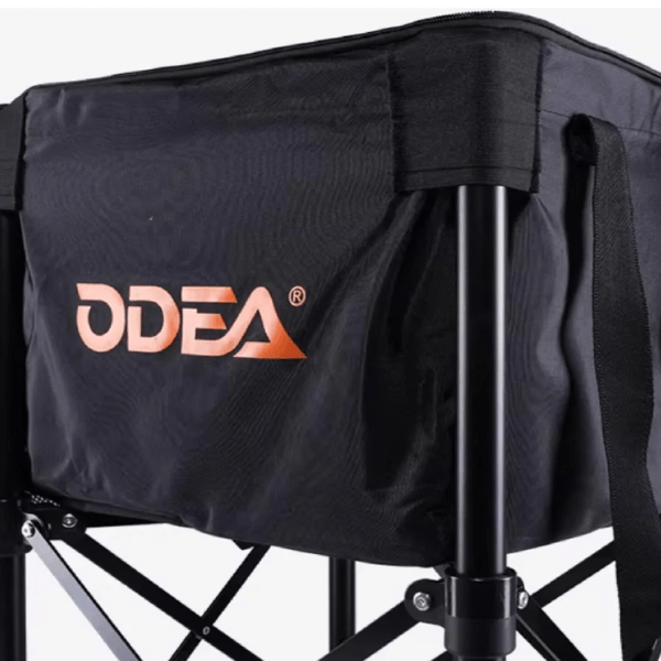 Black folding chair with 'ODEA' logo on a white background