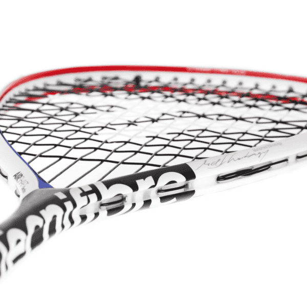 Close-up of a tennis racket with a white handle and red rim on a white background