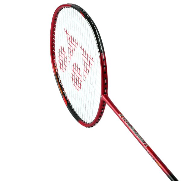 Red and black badminton racket on a white background